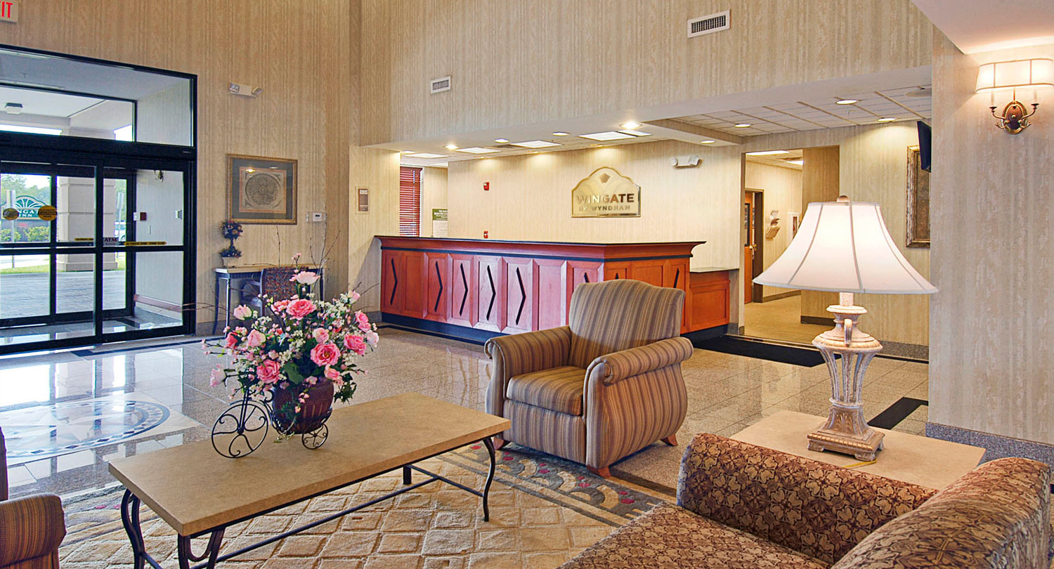 main reception and lobby with seating area and flowers on the main table